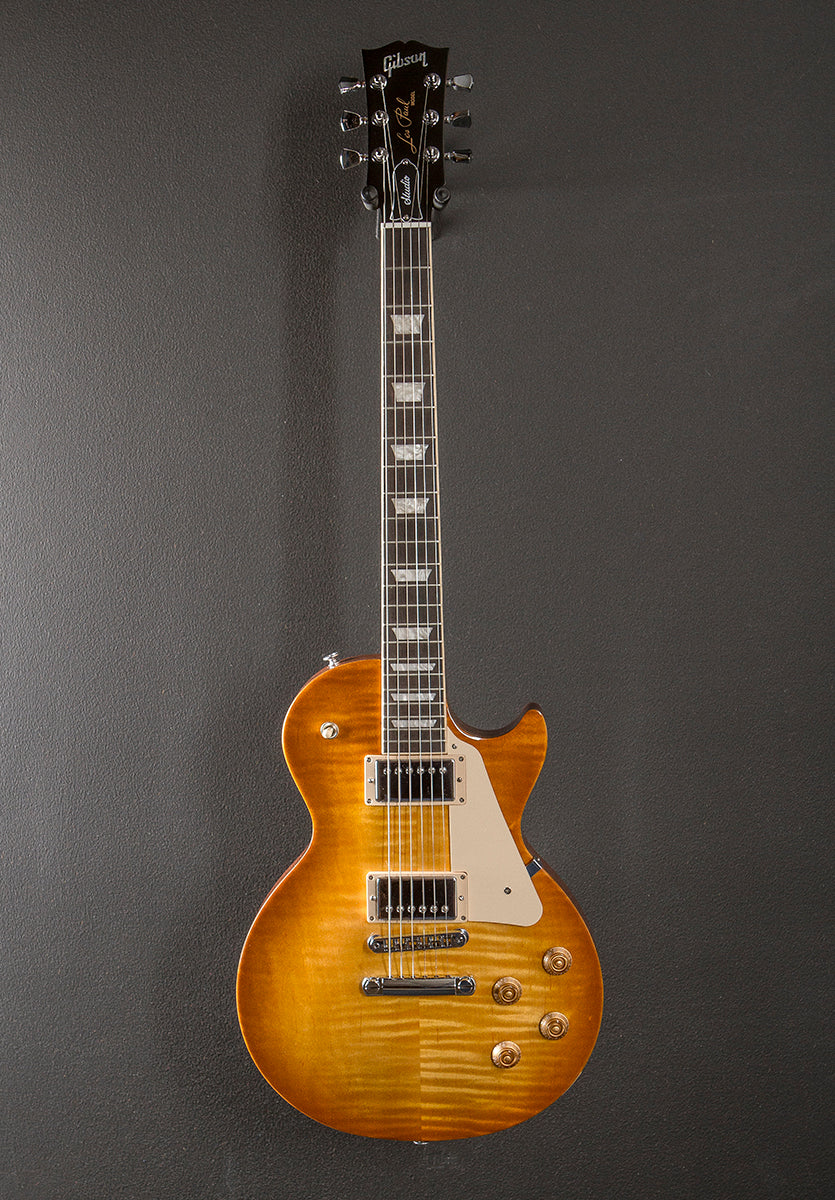 gibson les paul studio tobacco sunburst 2018 Electric Guitar Vintage Black Pickguard wired to innovative push/pull volume controls that unlock coil Gibson 120th Anniversary Les Paul