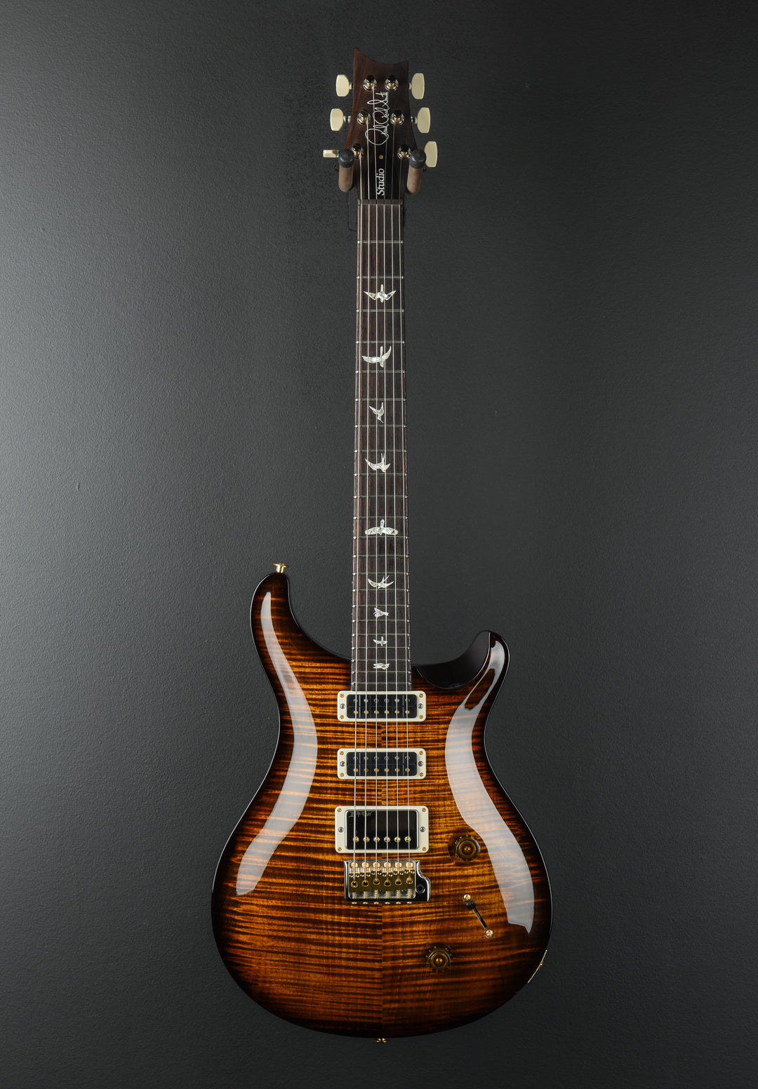 Studio 10 Top - Black Gold Wraparound Burst
